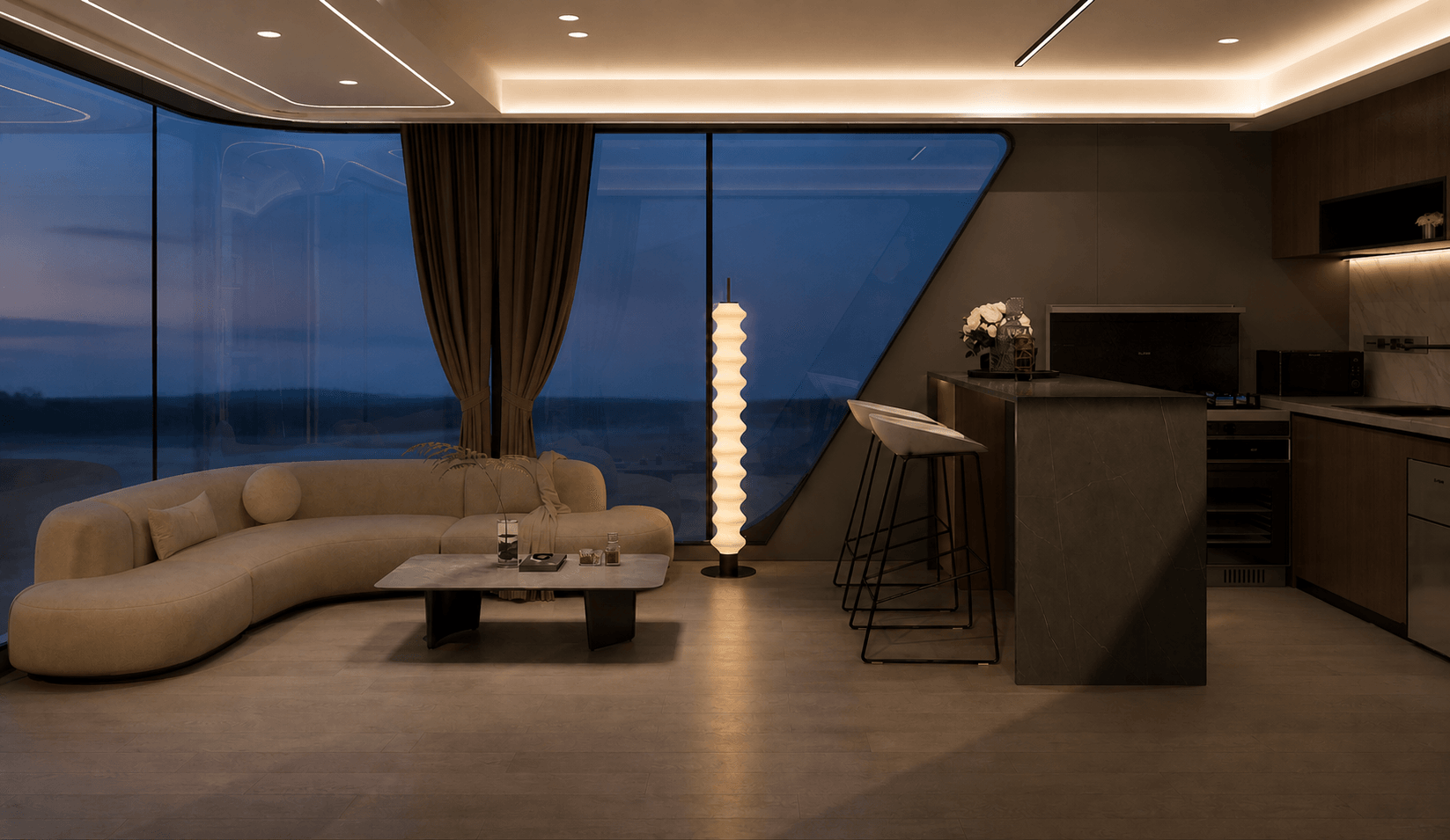 K7 living room and integrated kitchen illuminated in the evening